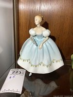 Front view of Royal Doulton First Dance figurine on shelf