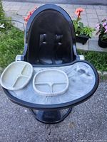 Front view of Bloom high chair with two silicone plates on tray
