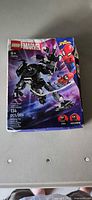 Front of sealed LEGO Marvel Venom mech set box, 134 pieces