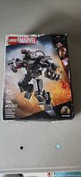 Front of sealed LEGO Marvel War Machine Mech Armor set 76277 box