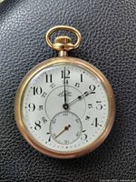 Front view showing Eaton dial, numerals, seconds sub-dial and crown