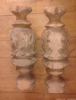 Front view of both carved oak baluster posts