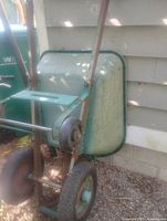 Front view showing dual wheels, frame, tub