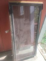 Front view of rectangular Velux skylight window showing full glass pane and frame