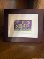 Full view of framed duck print with mat and frame