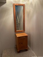 Cabinet and mirror together to show overall appearance