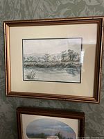 Rectangular watercolour river landscape in frame