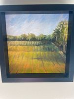 Front view of framed acrylic landscape painting