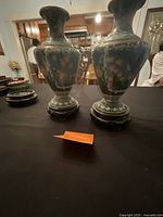 Pair of cloisonné vases on stands, overall view