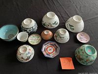 All ten porcelain bowls and dishes arranged showing designs and sizes