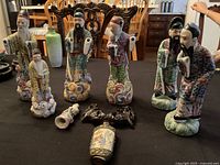 Group of porcelain figures, snuff bottle, stand, loose parts