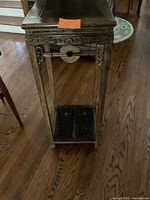 Full view of carved wooden Asian-style plant stand table