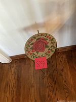 Top view of floral surface with red rose pattern