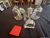 Group shot showing all glass and porcelain items on table