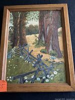 Full view of framed signed landscape painting