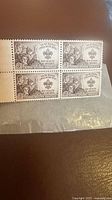Front view of mint 3¢ Boy Scouts of America stamp block of four with selvedge