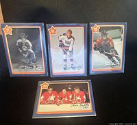 Front view of all four cards in sleeves showing numbers 7,11,19,31