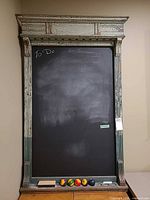 Full view of chalkboard with frame and accessories