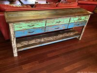 Front view showing six drawers, lower shelf, overall design