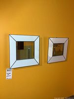 Both stained glass panels on wall