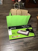 Retail box showing Tinvo VS200S vacuum sealer