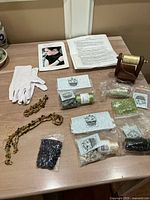 Overview of entire lot showing spool holder, kits, beads, gloves and instructions