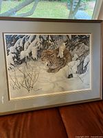 Full view of framed print with lynx in snowy setting