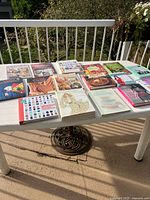 All books laid out on table