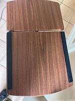 Top view showing split wood-grain laminate surface and anti-slip strips