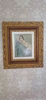 Full view of framed Madonna and Child print on wall