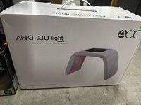Factory box showing ANQIXIU Light therapy dome image and branding