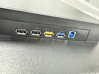 Close-up of USB hub ports on rear edge