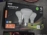 Front of sealed Feit Enhance BR30 LED 3-pack box