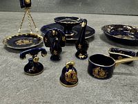 Group view of cobalt blue Limoges miniatures and dishes