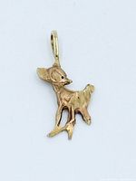 Front view of 10K gold fawn pendant with bail
