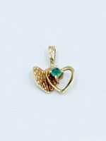Front view of 14K gold heart pendant with emerald