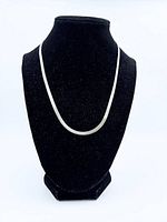 Full view of necklace on display bust