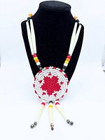 Front view on bust showing full necklace and pendant