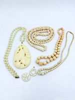 All necklaces and pendants arranged flat