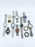 Group shot of all twelve watches laid out for overall view