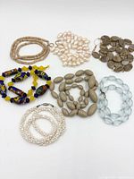 Group image showing all necklaces and earrings