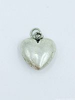 Front view of silver heart pendant