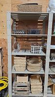 Shelving unit displaying all thirteen assorted baskets and organizers