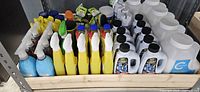 Full tray showing sprays, car wash bottles, detergent jugs
