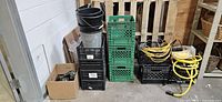 Overall lot showing crates, buckets, extension cords and hardware box