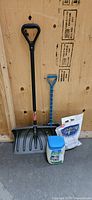 All four items: large shovel, kids shovel, salt bag, salt container