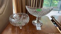 Both crystal bowls on table showing overall form and patterns