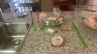 Group shot of all silver plate pieces on countertop