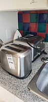 Lagostina toaster front, Black+Decker toaster front, iron behind