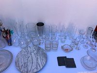 Overview of all glassware, marble lazy Susan, slate coasters, platter
